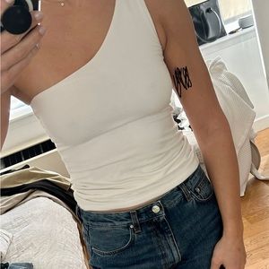 One shoulder white top